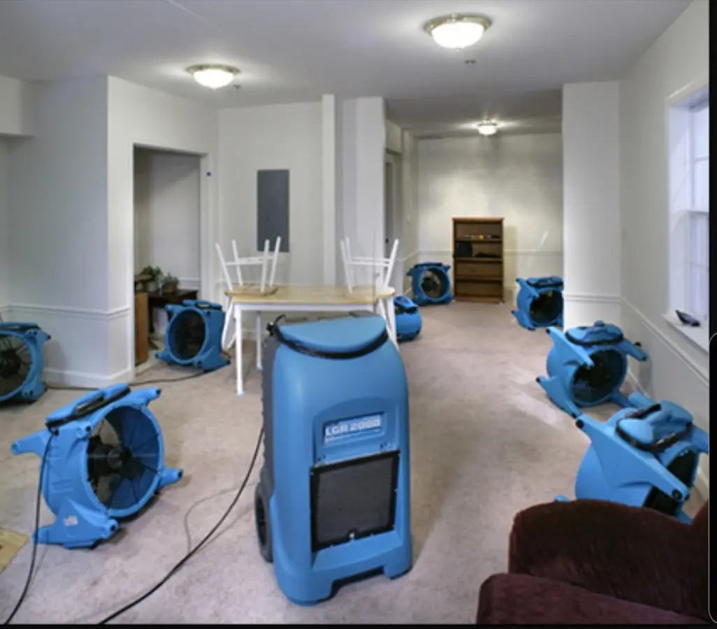Air movers and dehumidifier setup for Water Damage Restoration in Alvarado